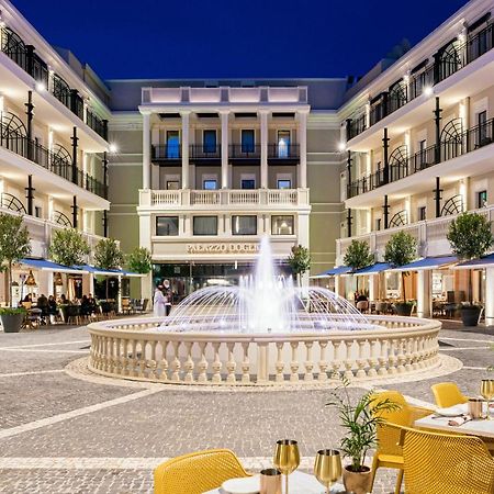Отель Palazzo Doglio Кальяри Экстерьер фото The Hotel's courtyard