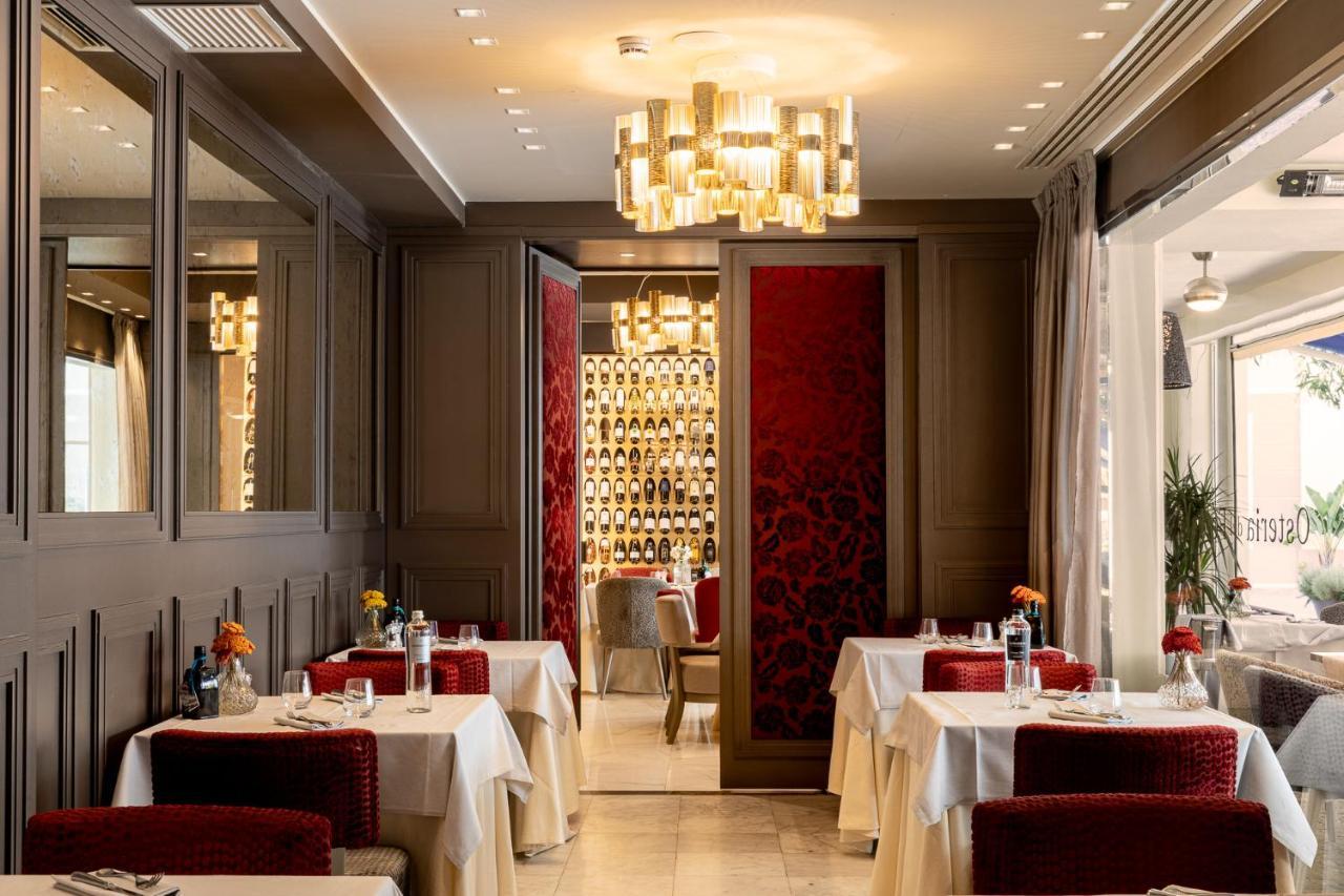 Отель Palazzo Doglio Кальяри Экстерьер фото Restaurant "La Table d'Or"