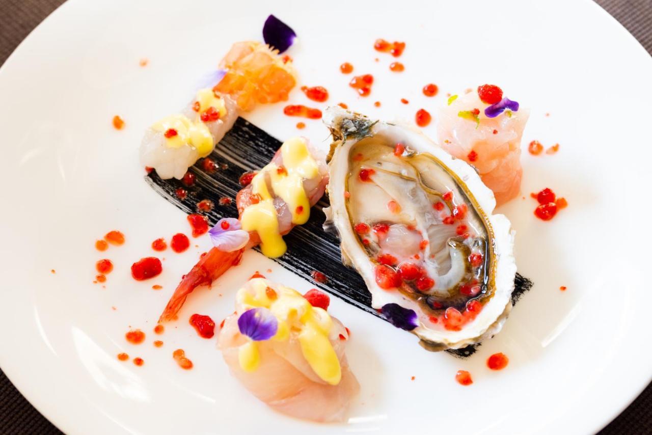 Отель Palazzo Doglio Кальяри Экстерьер фото Oyster with caviar