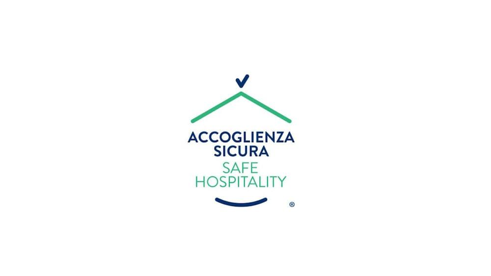 Отель Palazzo Doglio Кальяри Экстерьер фото Safe Hospitality logo